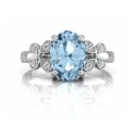 9ct White Gold Diamond And Oval Shaped Blue Topaz Engagement Ring 0.03 Carats