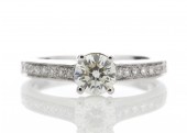 18ct White Gold Single Stone Claw Set Diamond Ring With Stone Set Shoulders (0.60) 0.73 Carats