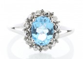 9ct White Gold Blue Topaz Diamond Cluster Ring 0.04 Carats